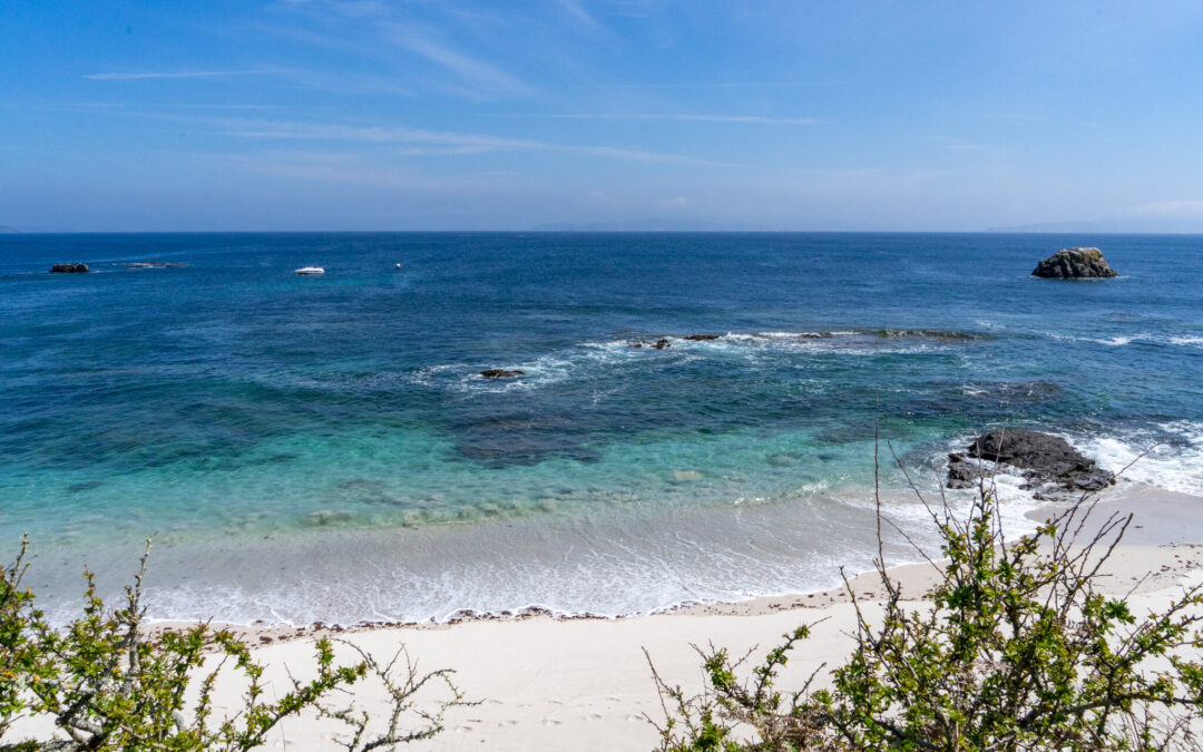 Canexol Beach on Ons Island in southern Galicia with fine, white sand and crystal-clear blue waters.