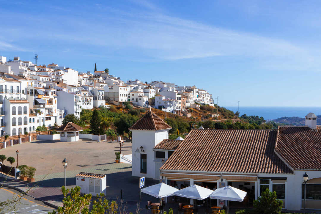 Square of the Three Cultures in the white village of Frigiliana, Andalusia, Spain.