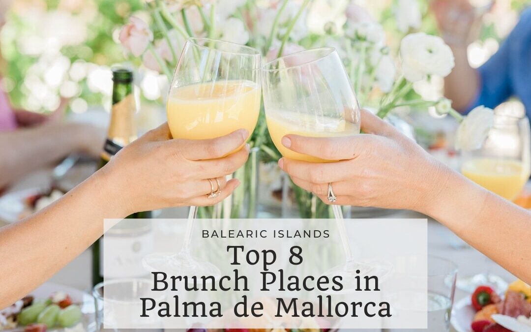 Friends enjoying Brunch with Mimosa cocktails in Palma de Mallorca, Balearic Islands, Spain.